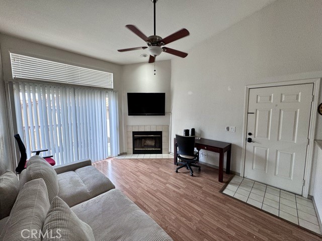 42140 Lyndie Lane, Unit 24 Temecula, CA 92591 - Photo 6 of 35 a living room with furniture and a fireplace