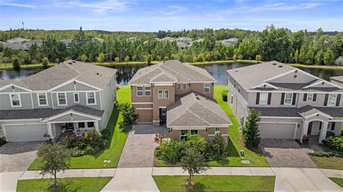 an aerial view of a house with a garden