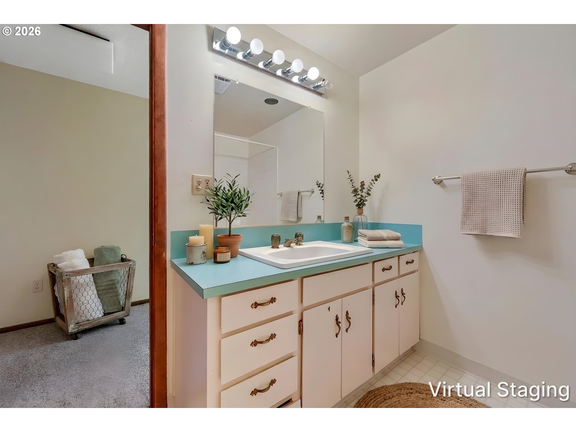 45354 Northwest Hartwick Road Banks, OR 97106 - Photo 19 of 35 a bathroom with a granite countertop sink a large mirror and a