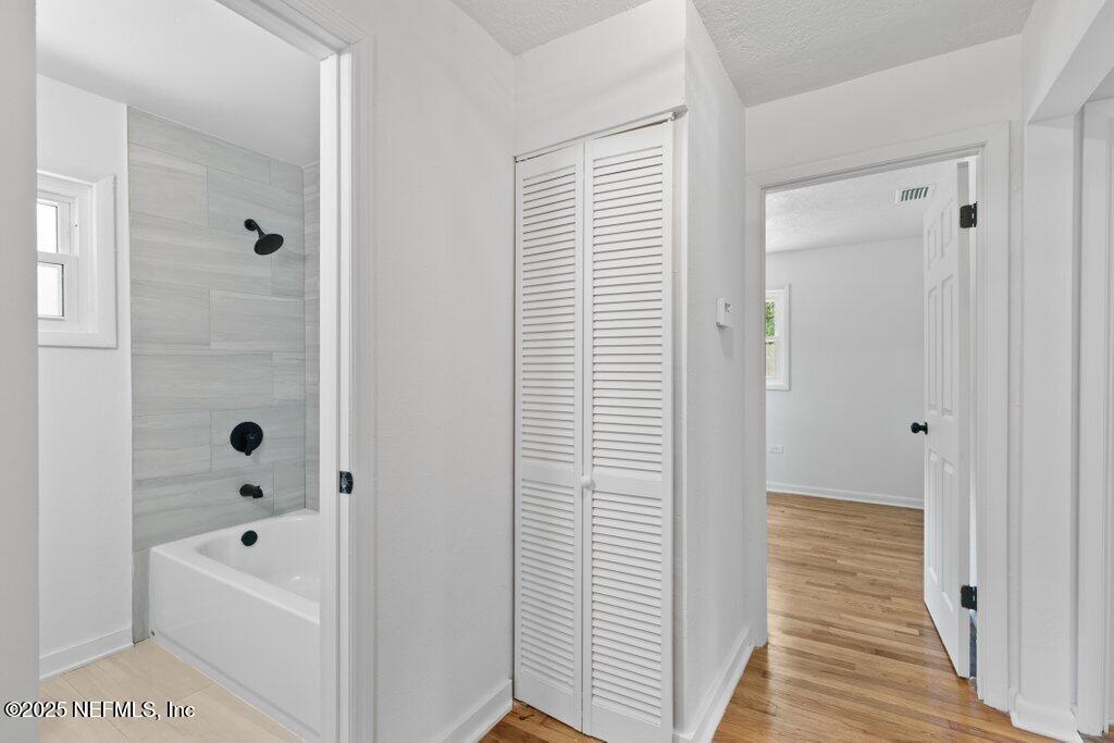 2389 Hilly Road Jacksonville, FL 32208 - Photo 12 of 35 Hallway + Bath