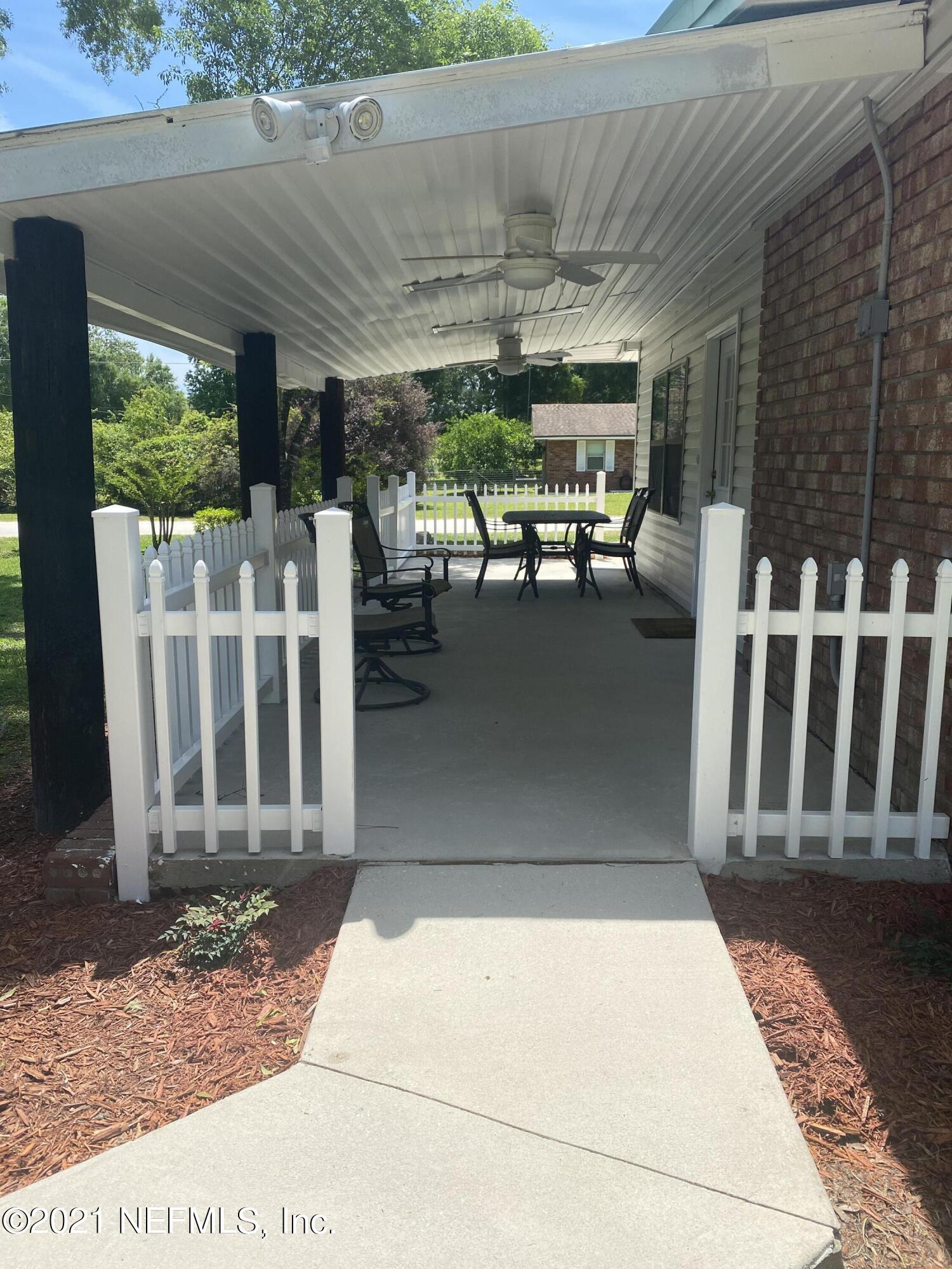 5983 Acre Road Macclenny, FL 32063 - Photo 17 of 46 Concrete walkway to the side porch