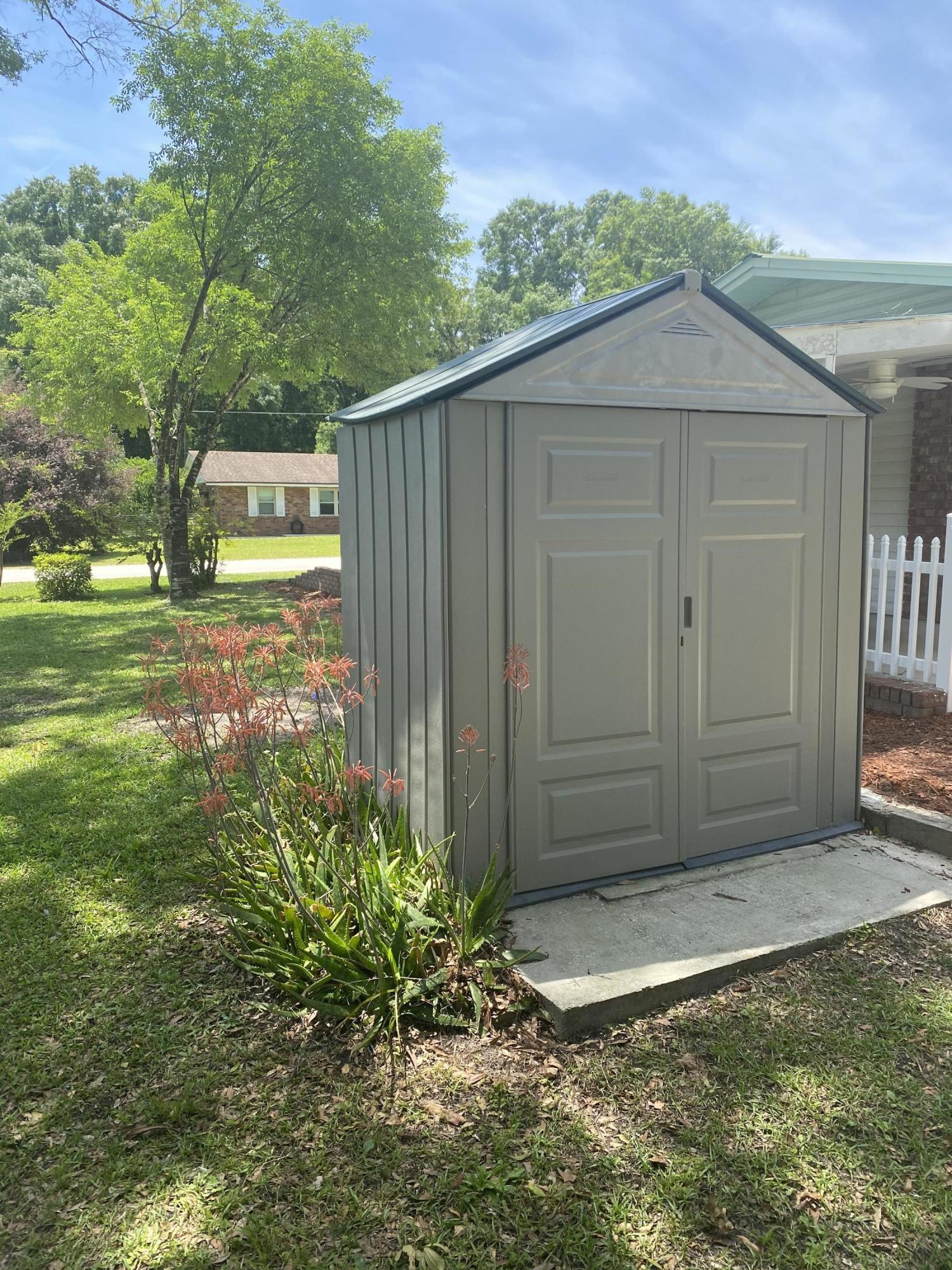 5983 Acre Road Macclenny, FL 32063 - Photo 38 of 46 Pump and water softener storage