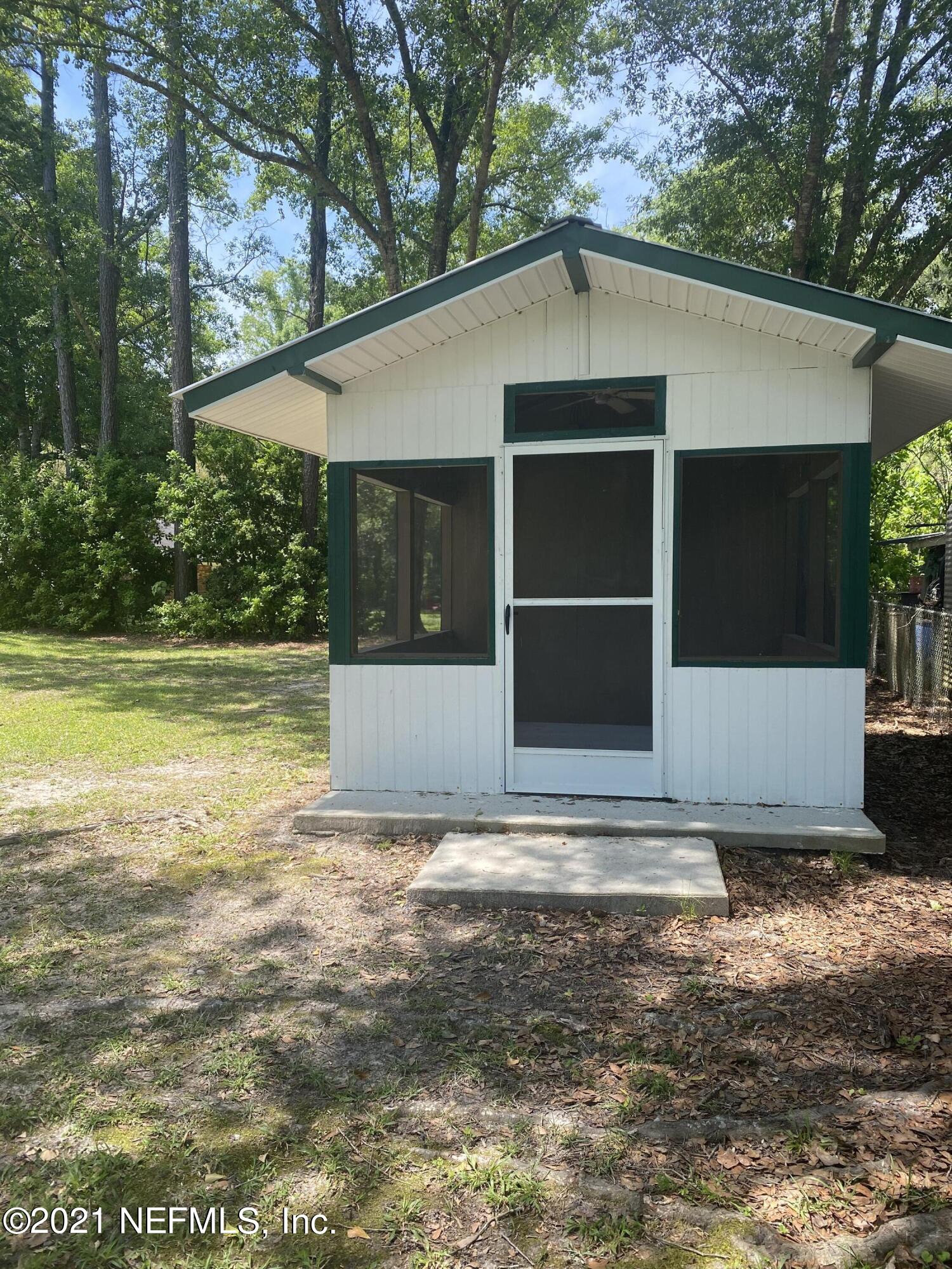 5983 Acre Road Macclenny, FL 32063 - Photo 41 of 46 Screened Cookhouse