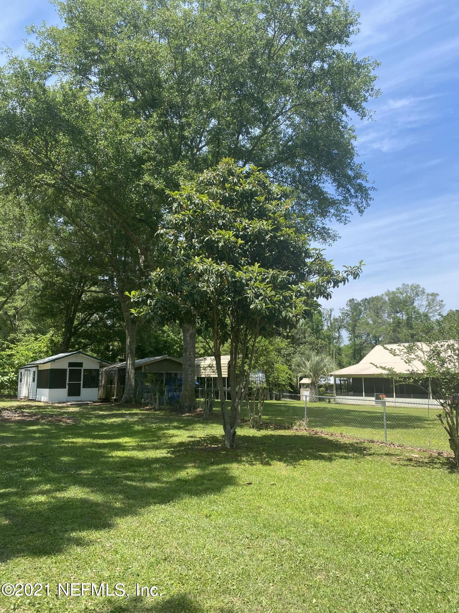 5983 Acre Road Macclenny, FL 32063 - Photo 9 of 46 backyard - loquat tree