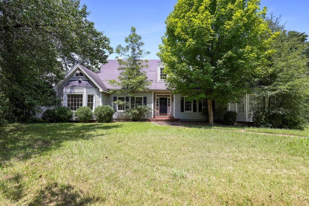 1917 Defoor Avenue Northwest Atlanta, GA 30318 - Photo 14 of 35 a front view of a house with a garden