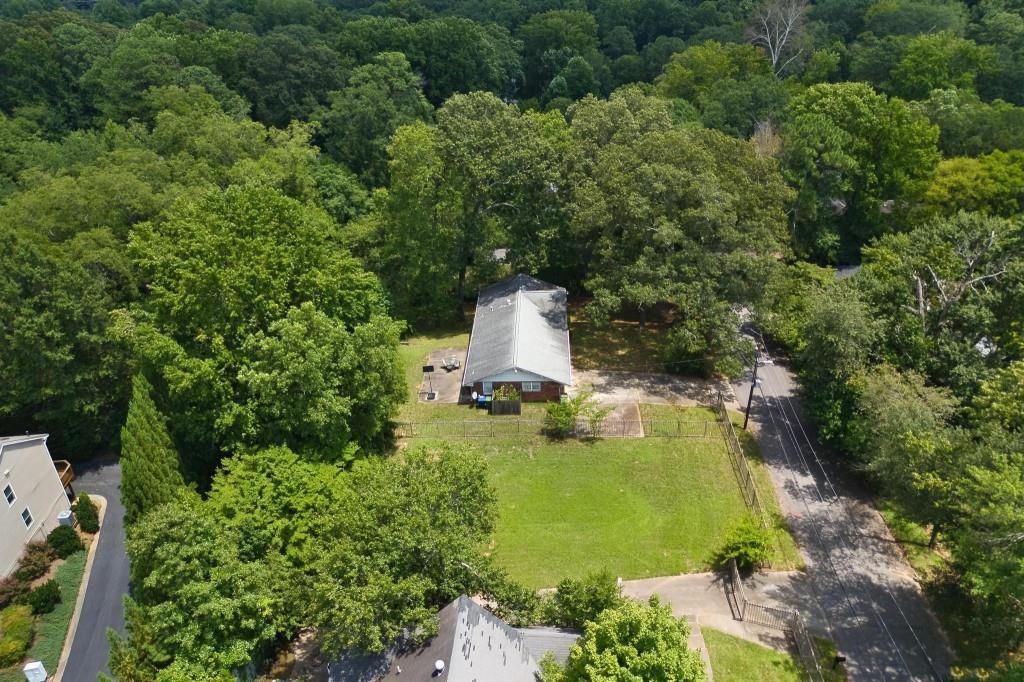 1917 Defoor Avenue Northwest Atlanta, GA 30318 - Photo 34 of 35 an aerial view of a house with a yard and lake view
