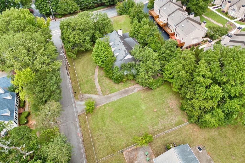 1917 Defoor Avenue Northwest Atlanta, GA 30318 - Photo 4 of 35 an aerial view of residential house with outdoor space and trees all around