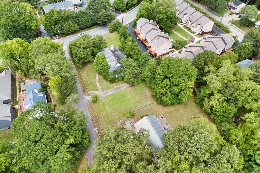 1917 Defoor Avenue Northwest Atlanta, GA 30318 - Photo 6 of 35 an aerial view of residential house with outdoor space and trees all around
