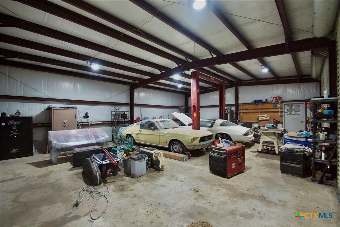 27 Stehle Road Victoria, TX 77905 - Photo 15 of 34 a utility room with lots of furniture and clutter