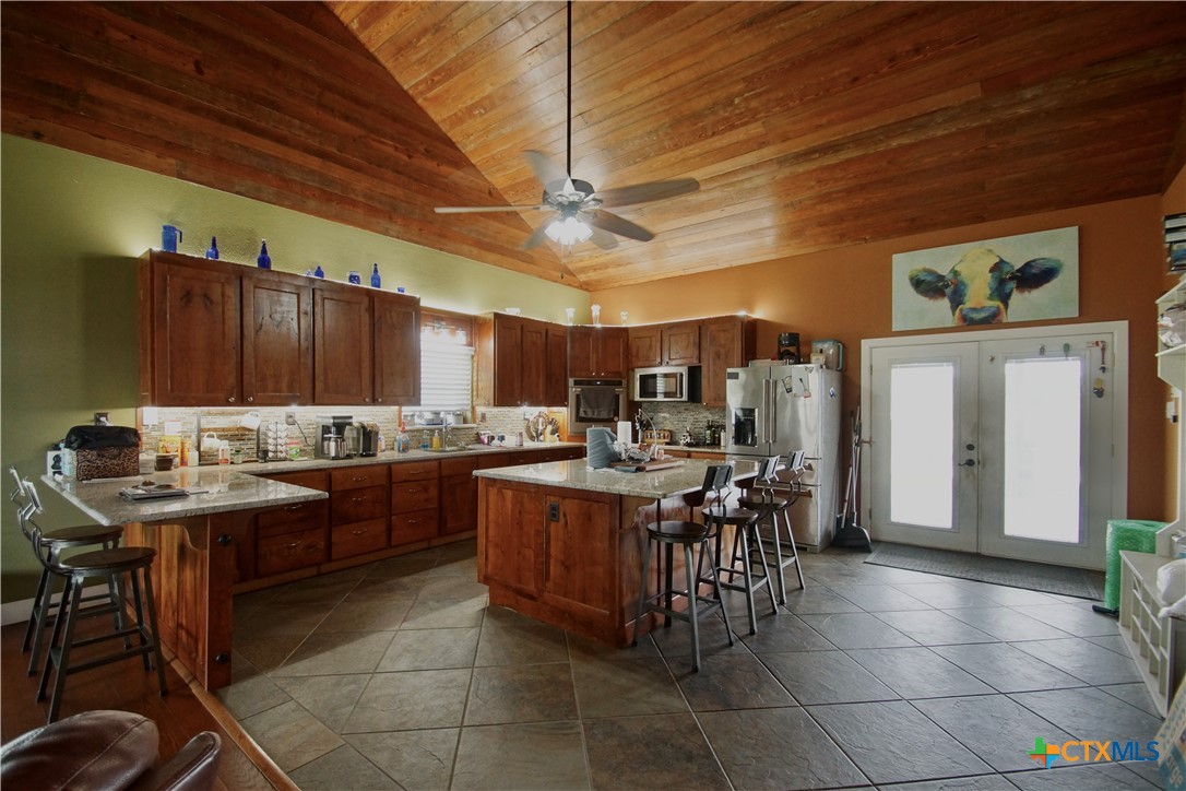 27 Stehle Road Victoria, TX 77905 - Photo 18 of 34 a kitchen with a sink a counter top space and appliances