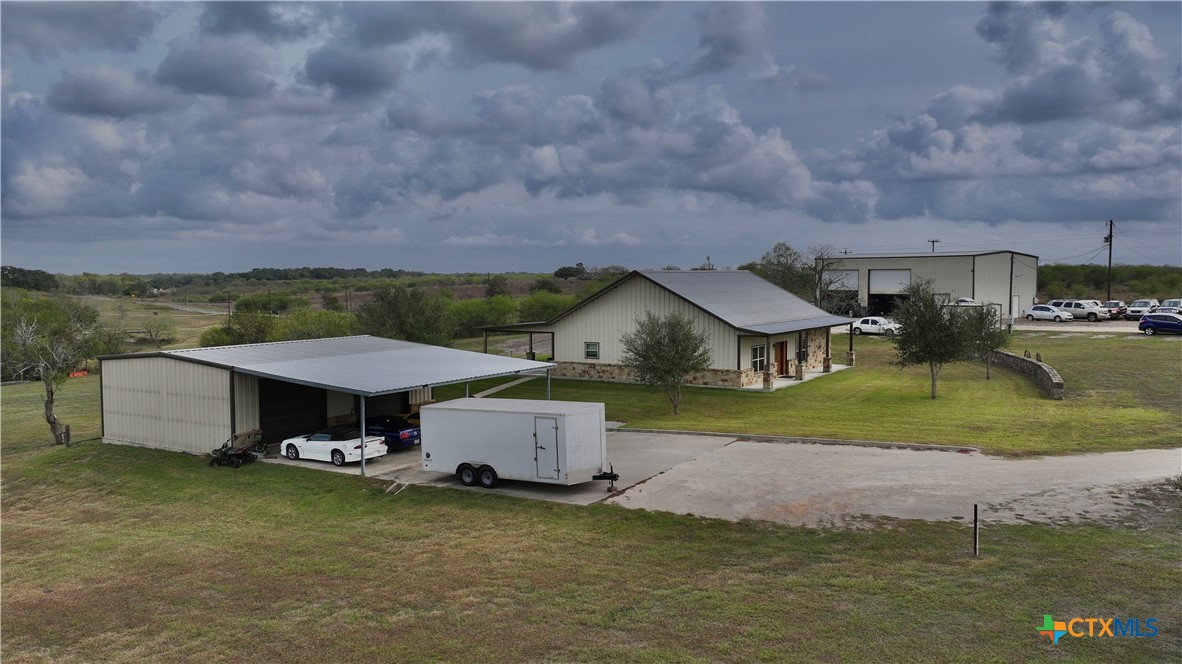 27 Stehle Road Victoria, TX 77905 - Photo 4 of 34 an aerial view of a house with swimming pool and a yard