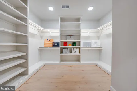 a view of storage and utility room with empty racks