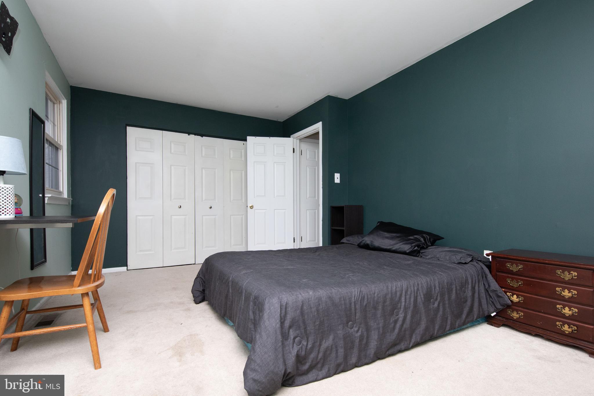 2086 Fort Bevon Road Harleysville, PA 19438 - Photo 23 of 24 a bedroom with a bed a desk and chair