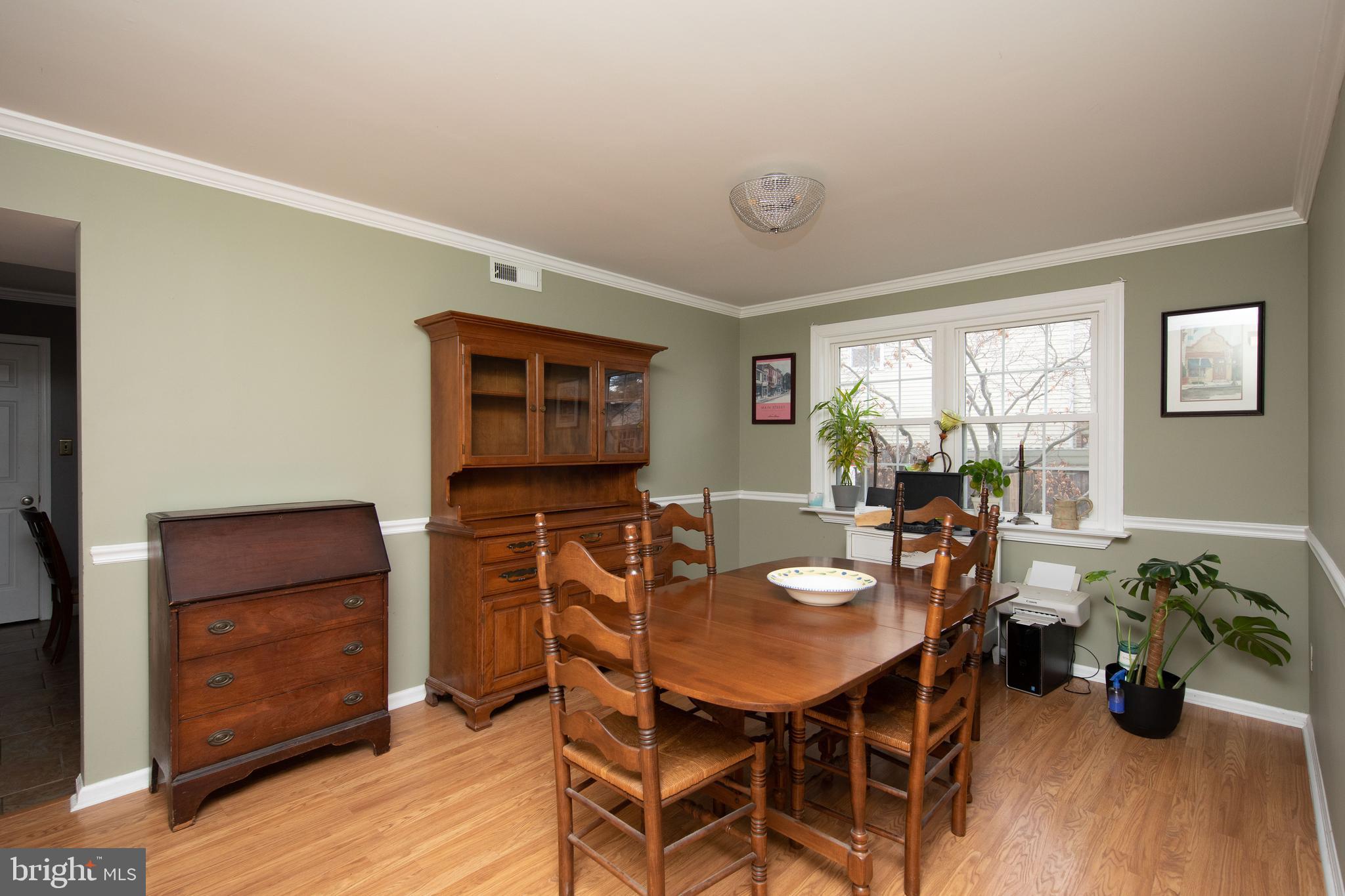 2086 Fort Bevon Road Harleysville, PA 19438 - Photo 5 of 24 a view of a dining room with furniture window and wooden floor