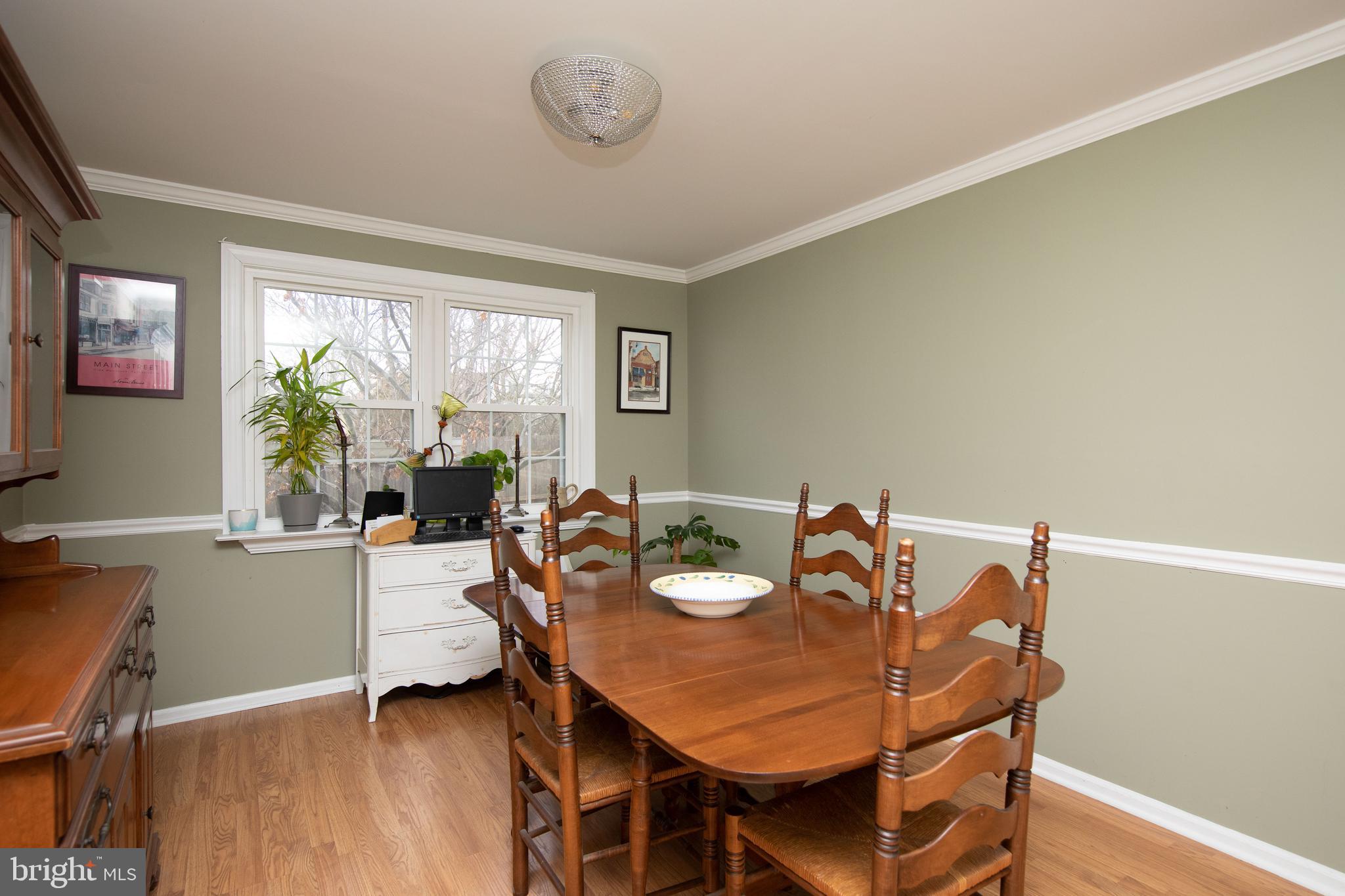 2086 Fort Bevon Road Harleysville, PA 19438 - Photo 6 of 24 a view of a dining room with furniture window and wooden floor