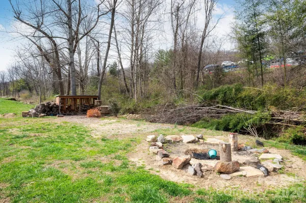 a backyard of a house with lots of green space