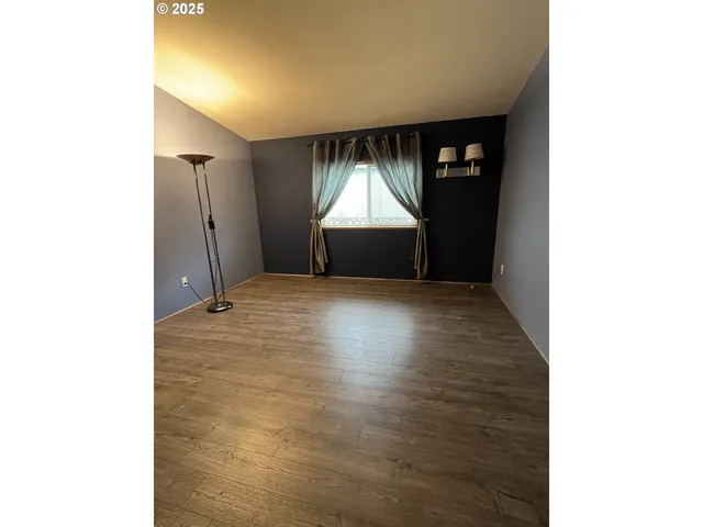 a bathroom with a shower and a bath tub