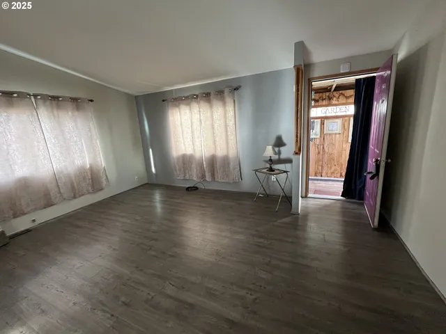 a view of a kitchen with cabinets