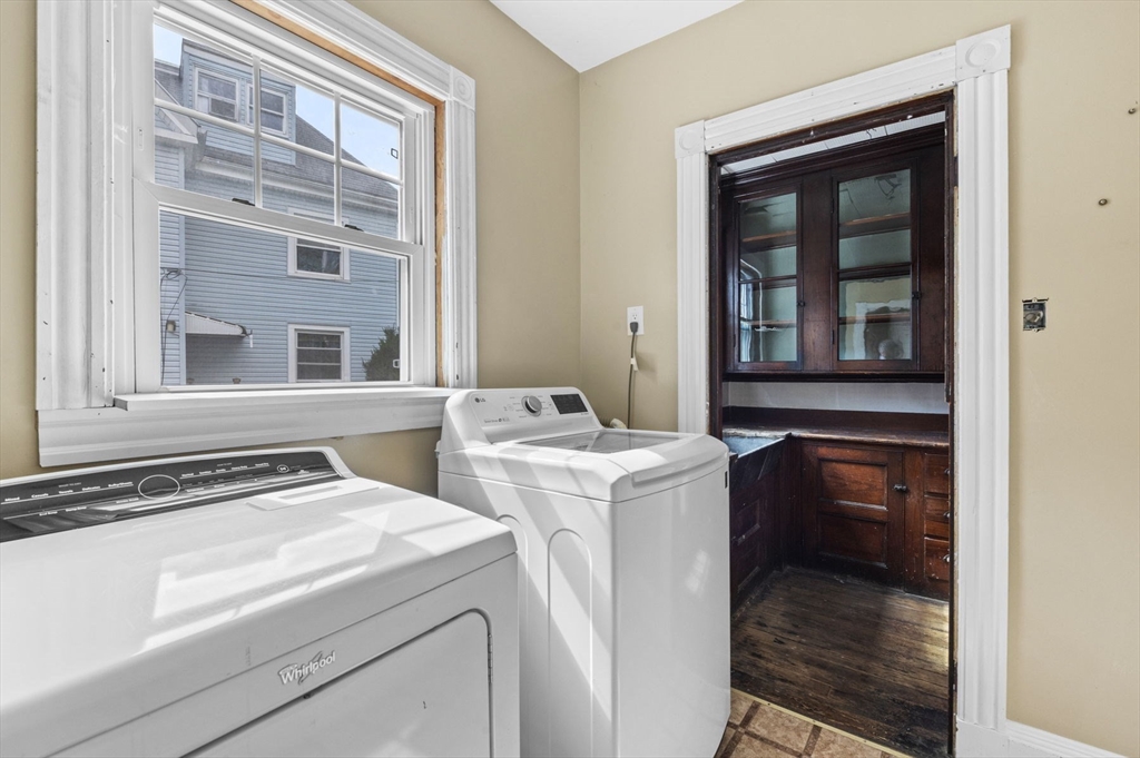 366 Cabot Street Beverly, MA 01915 - Photo 13 of 42 a utility room with dryer and washer