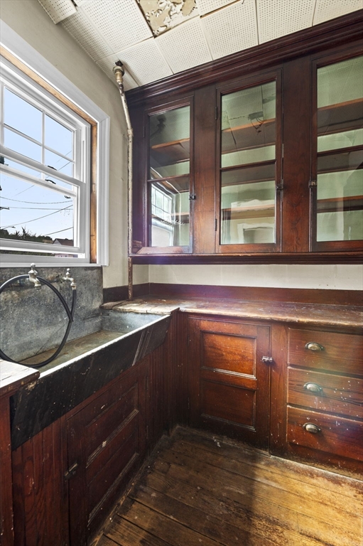 366 Cabot Street Beverly, MA 01915 - Photo 14 of 42 a kitchen with a sink and a large window