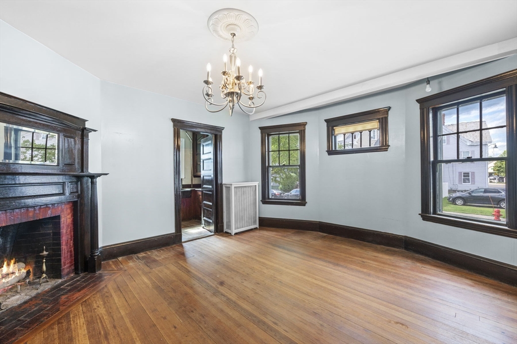 366 Cabot Street Beverly, MA 01915 - Photo 19 of 42 wooden floor in an empty room with a window