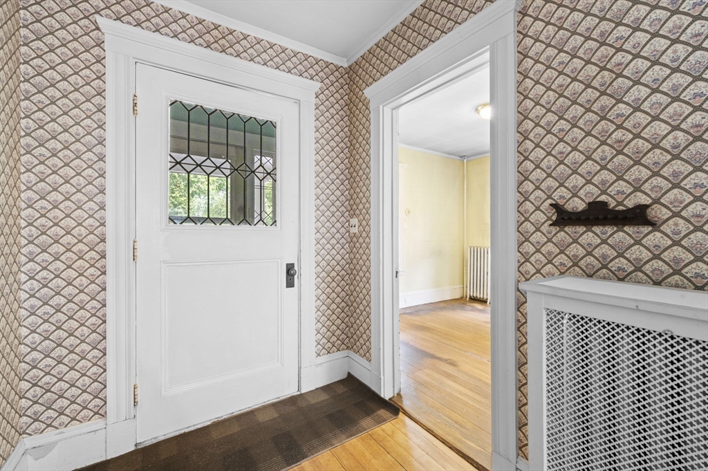 366 Cabot Street Beverly, MA 01915 - Photo 9 of 42 an empty room with wooden floor and a large window