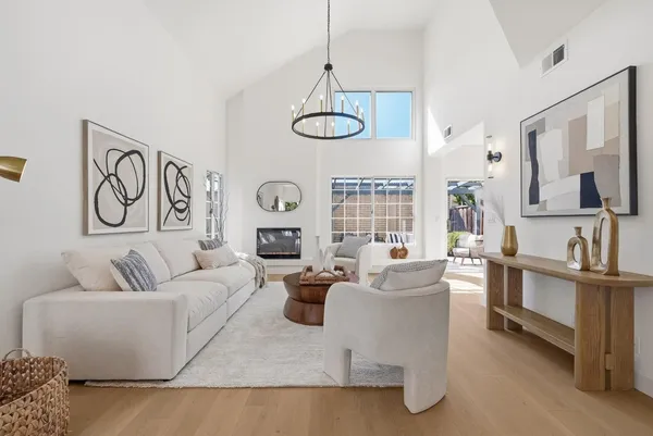 a living room with furniture and windows