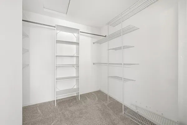 a view of an empty walk in closet