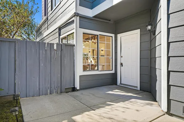 a view of a door and wooden floor