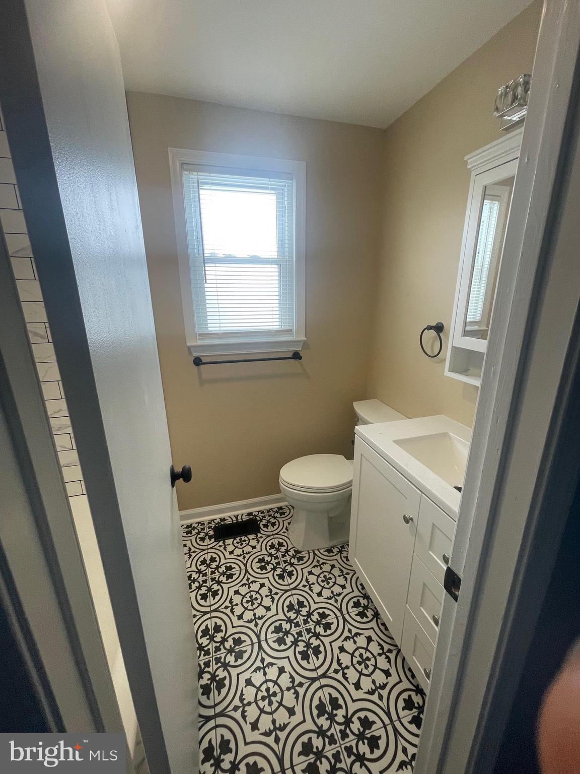 3 Farmhouse Court Sicklerville, NJ 08081 - Photo 10 of 24 a bathroom with a sink and a toilet