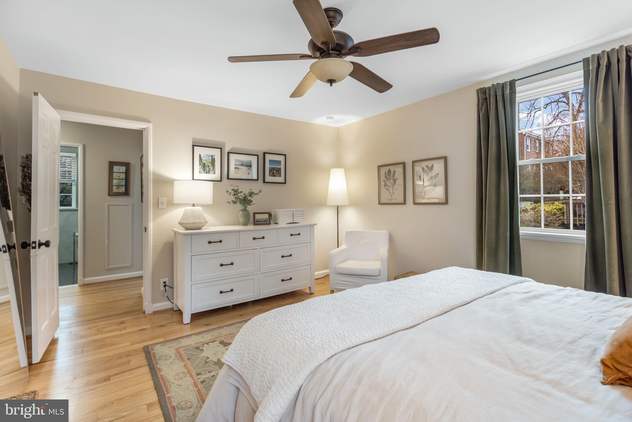 4225 32nd Road South Arlington, VA 22206 - Photo 19 of 36 a bedroom with a bed and a dresser
