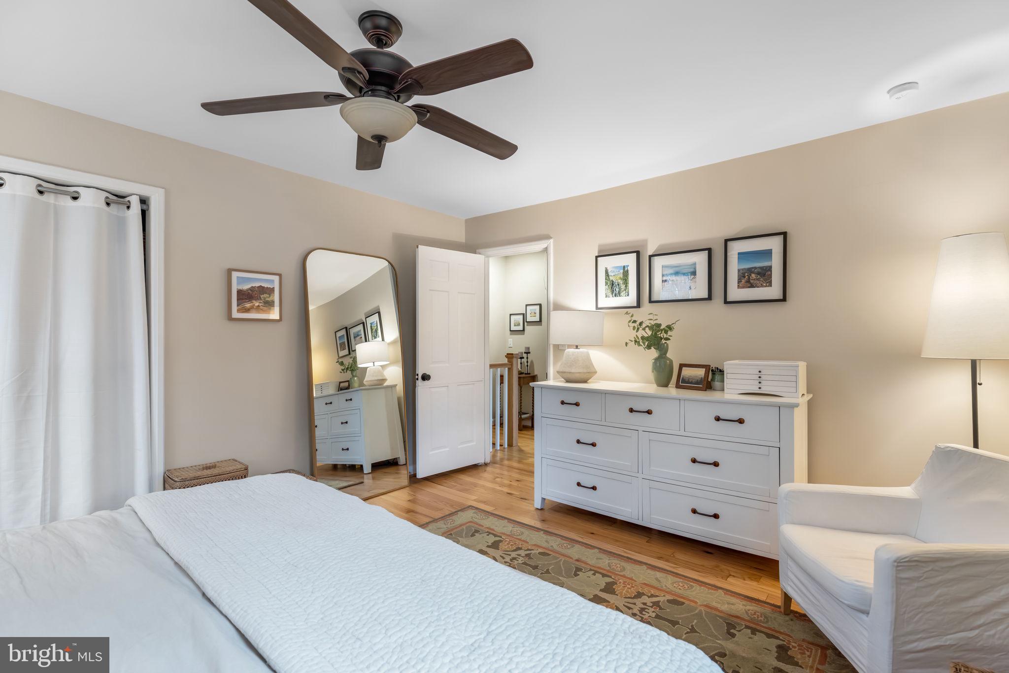 4225 32nd Road South Arlington, VA 22206 - Photo 20 of 36 a bed room with a bed and a ceiling fan