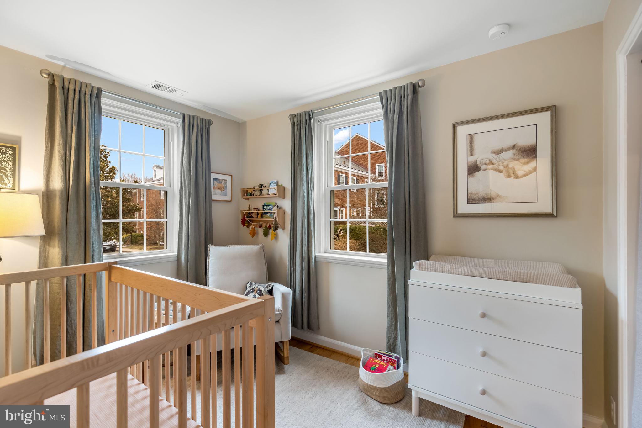 4225 32nd Road South Arlington, VA 22206 - Photo 21 of 36 a bedroom with furniture and a window