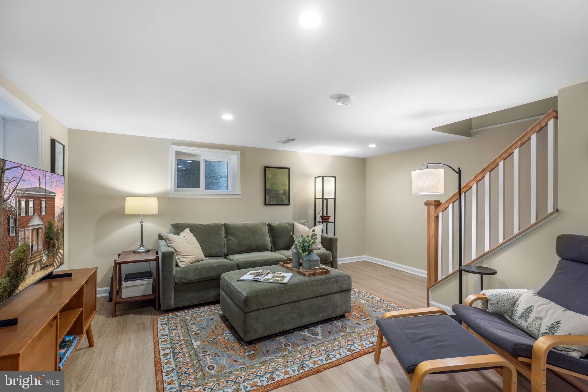 4225 32nd Road South Arlington, VA 22206 - Photo 27 of 36 a living room with furniture and a flat screen tv
