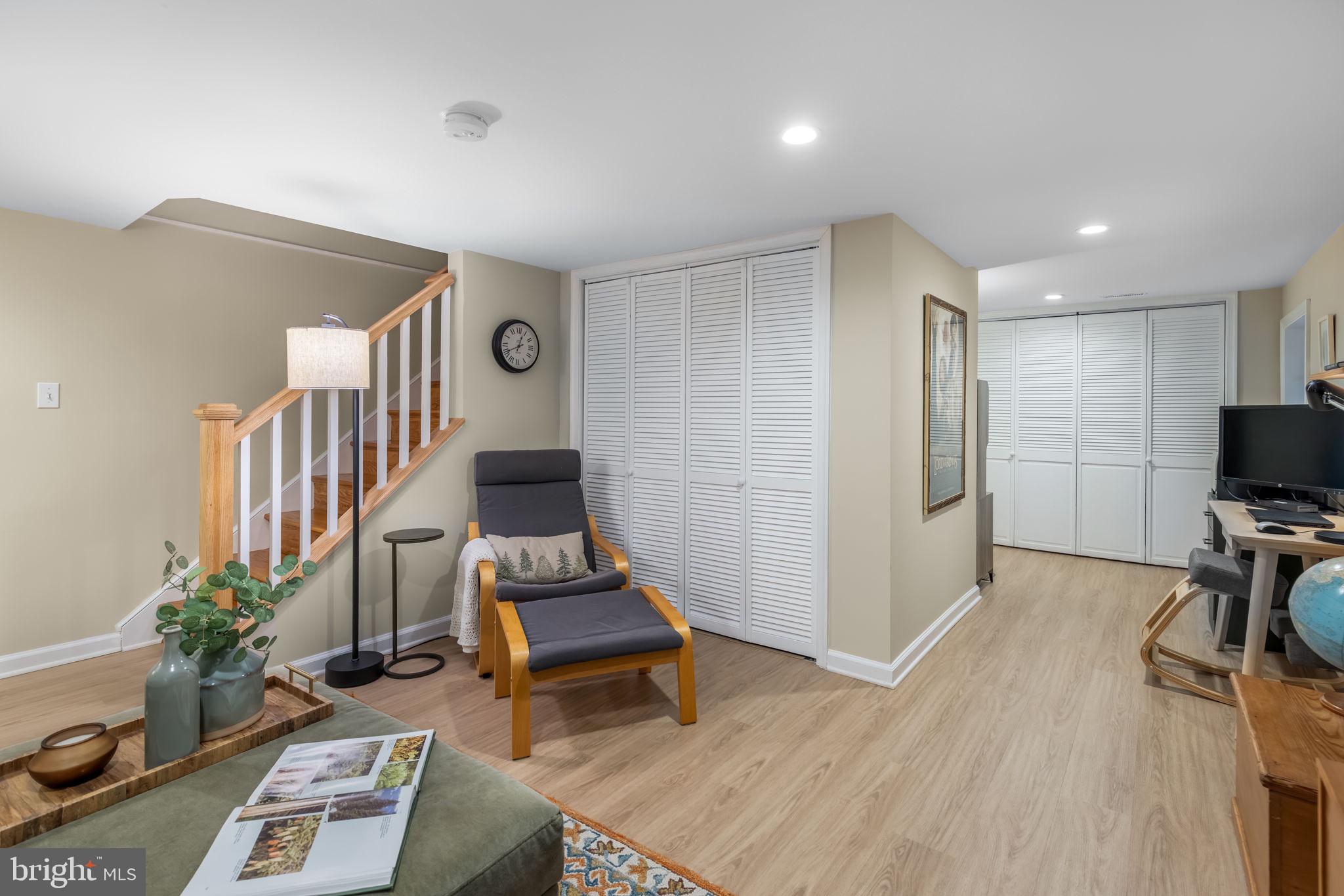 4225 32nd Road South Arlington, VA 22206 - Photo 28 of 36 a living room with furniture a rug and a flat screen tv