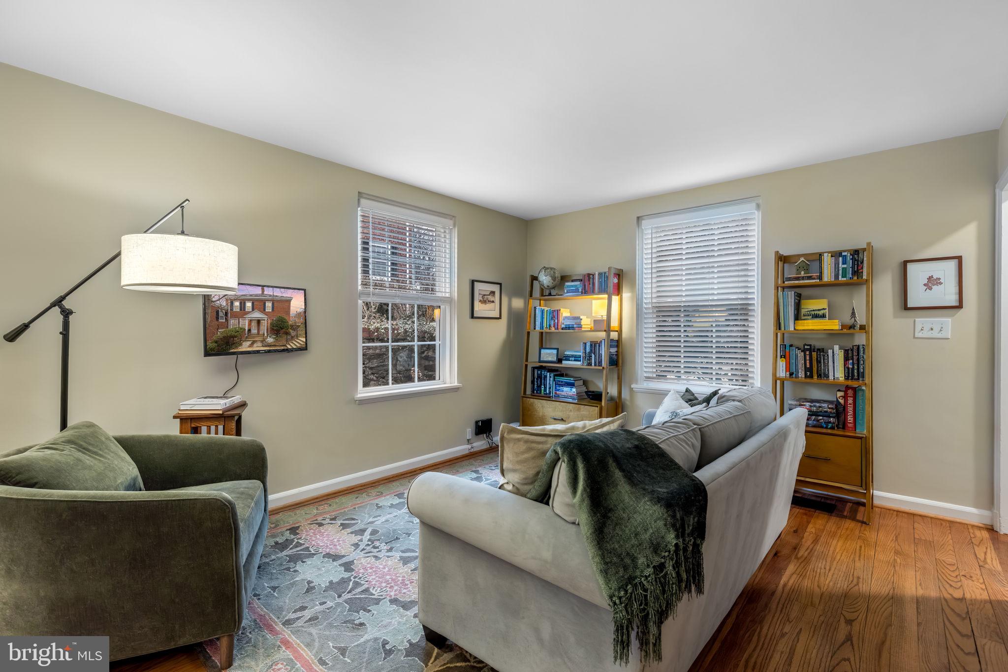 4225 32nd Road South Arlington, VA 22206 - Photo 3 of 36 a living room with furniture and a flat screen tv