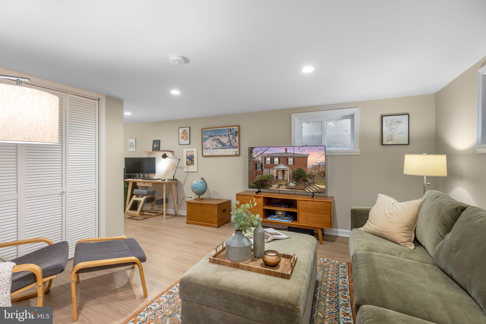 4225 32nd Road South Arlington, VA 22206 - Photo 5 of 36 a living room with furniture and a flat screen tv