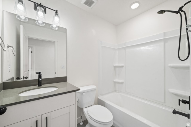 70 East Weekes Way Clearfield, UT 84015 - Photo 8 of 25 Bathroom with shower / bath combination and vanity