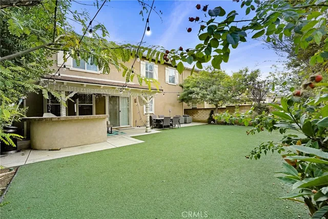 a house view with a garden space
