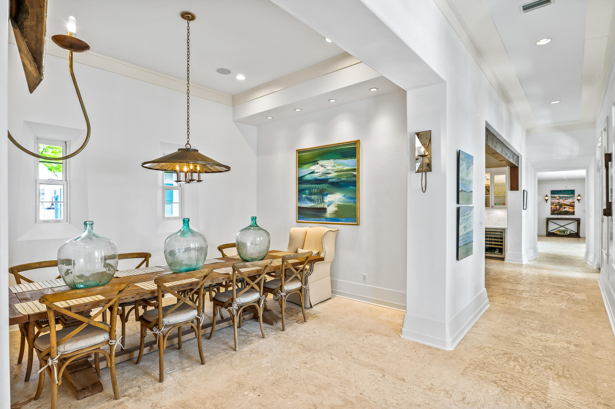 140 North Charles St Inlet Beach Inlet Beach, FL 32461 - Photo 32 of 72 a view of a dining room and livingroom with furniture wooden floor a chandelier