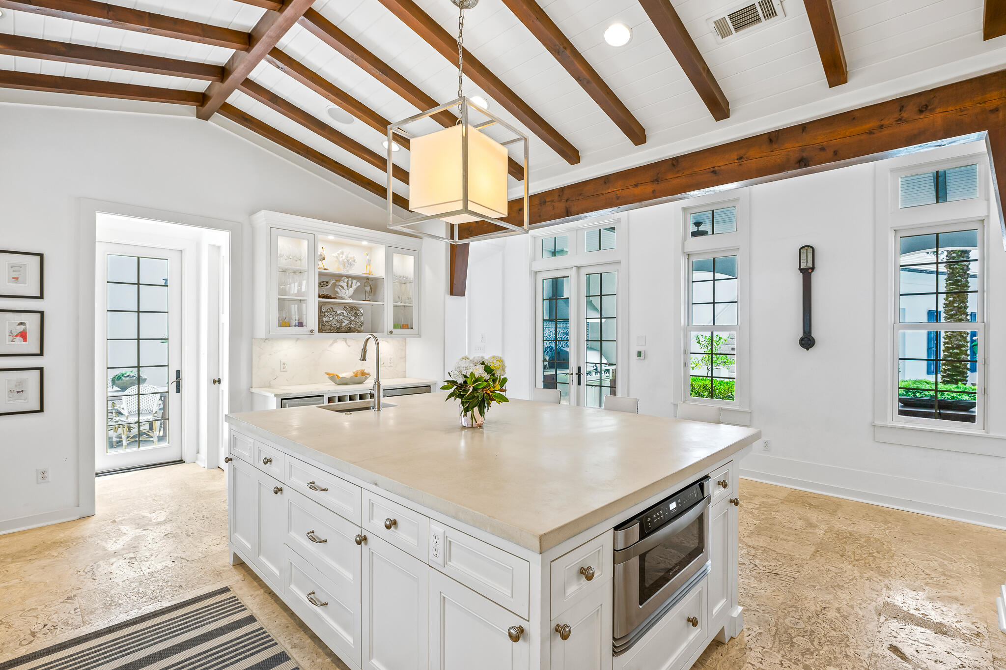 140 North Charles St Inlet Beach Inlet Beach, FL 32461 - Photo 38 of 72 a kitchen with stainless steel appliances granite countertop a sink and a refrigerator
