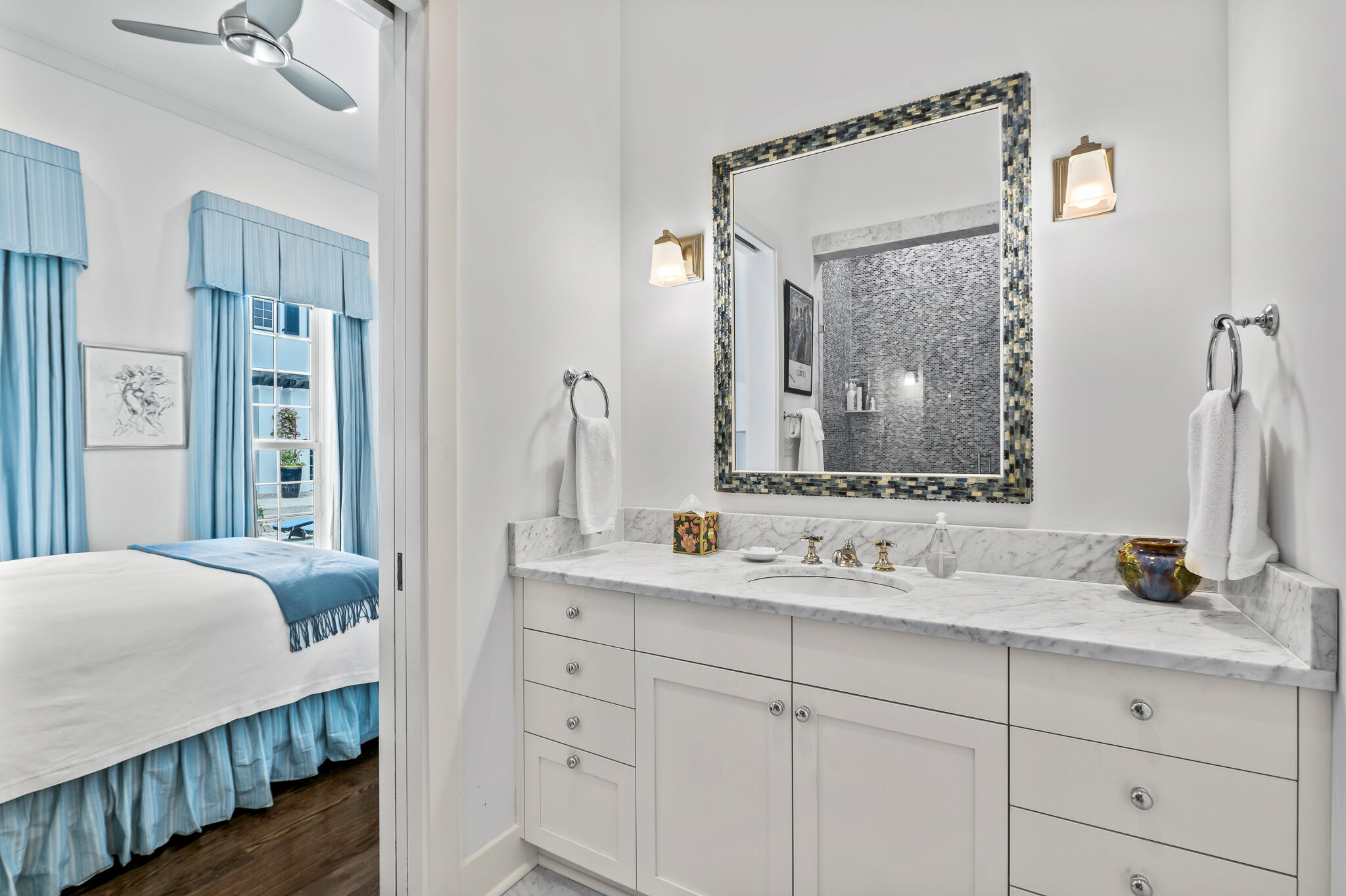 140 North Charles St Inlet Beach Inlet Beach, FL 32461 - Photo 50 of 72 a bathroom with a double vanity sink and a mirror