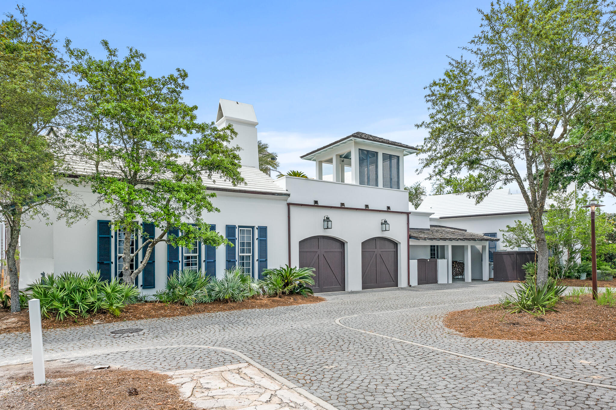 140 North Charles St Inlet Beach Inlet Beach, FL 32461 - Photo 72 of 72 a view of a white house with a tree and plants