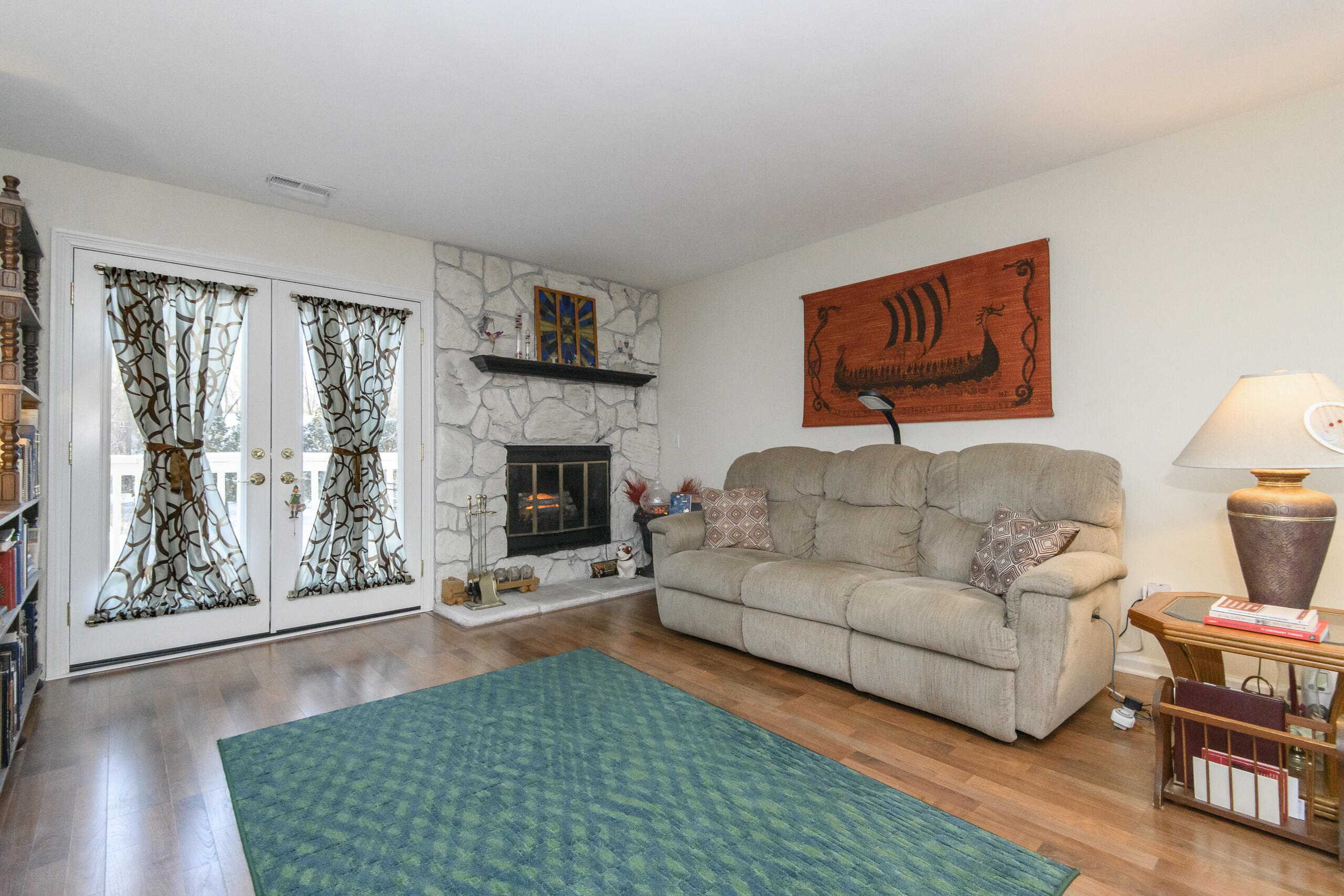 323 Riverview Drive Delafield, WI 53018 - Photo 8 of 36 French door to balcony