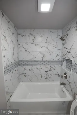a bathroom with a bathtub