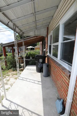 a view of a porch with furniture