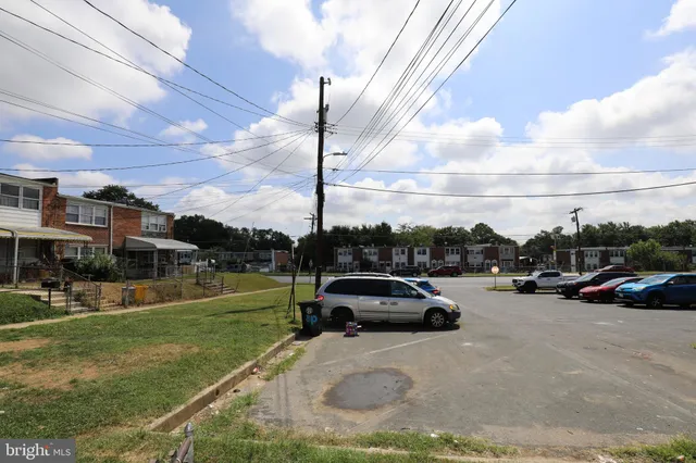 a view of a city street with cars