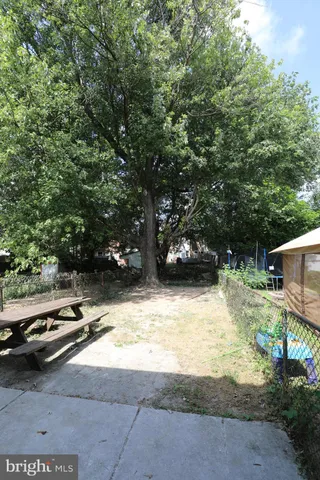 a view of swimming pool with chairs