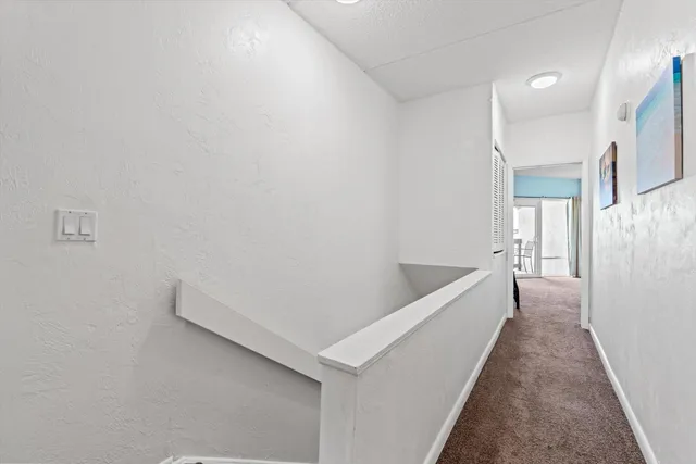 a hallway with windows