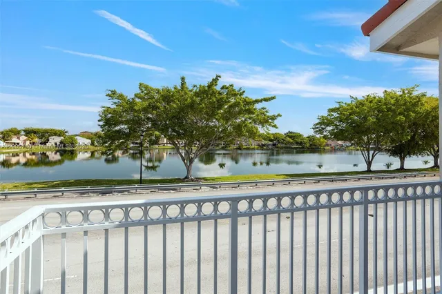 a view of a street from a balcony